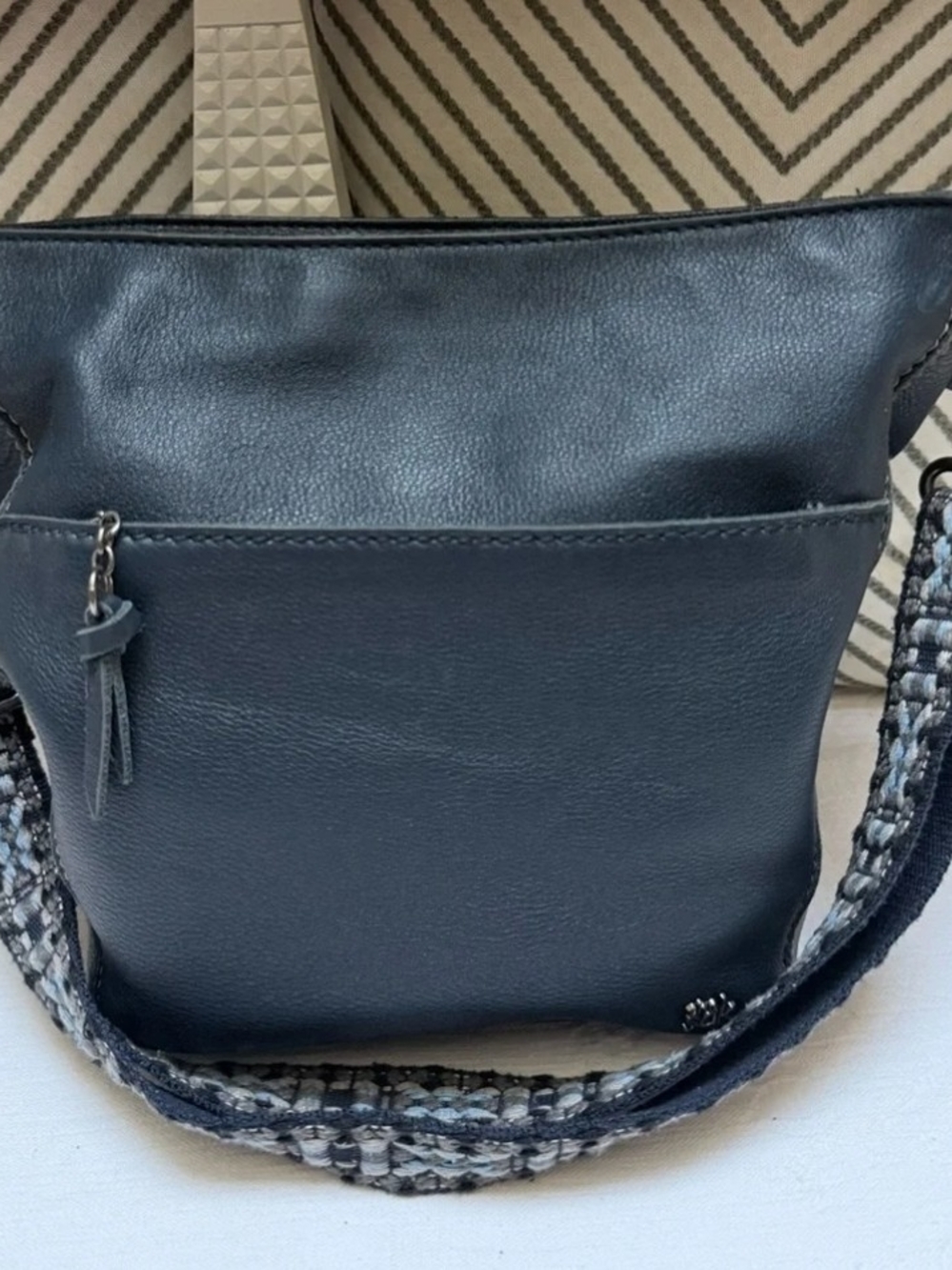 The Sak Navy Leather Shoulder Bag with Woven Strap